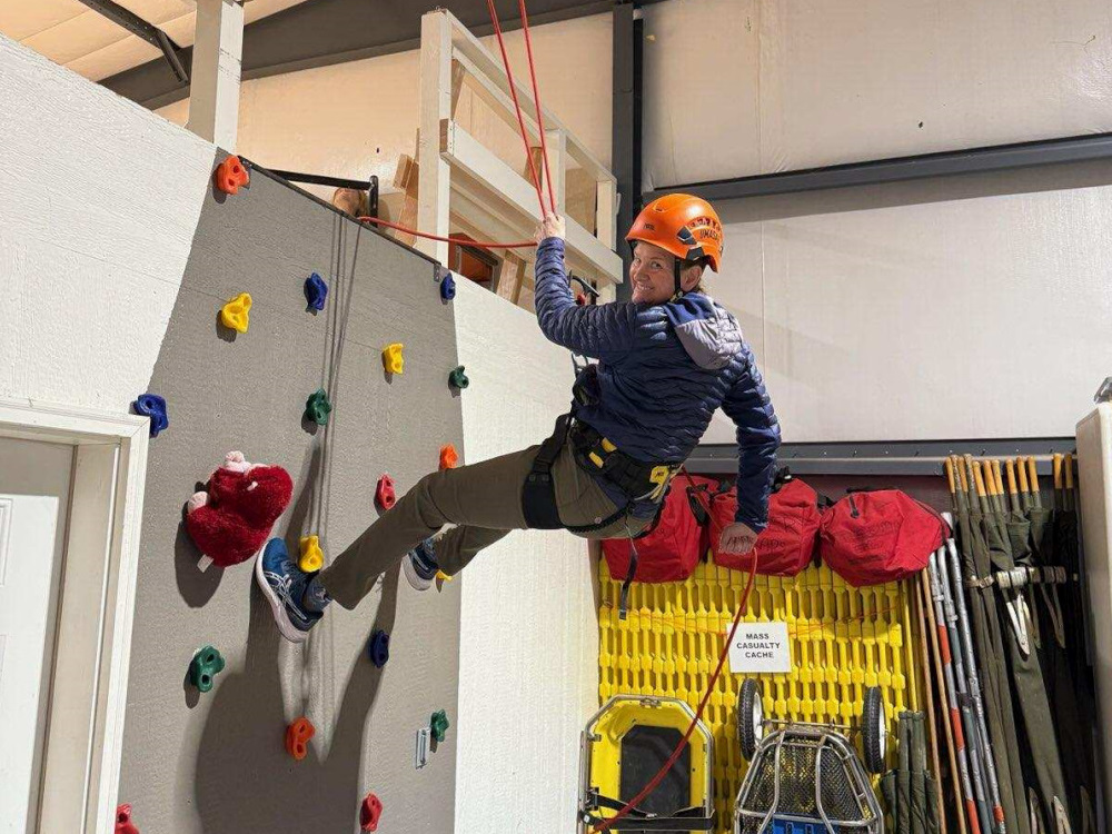 Searcher Durfee on the rappel training wall